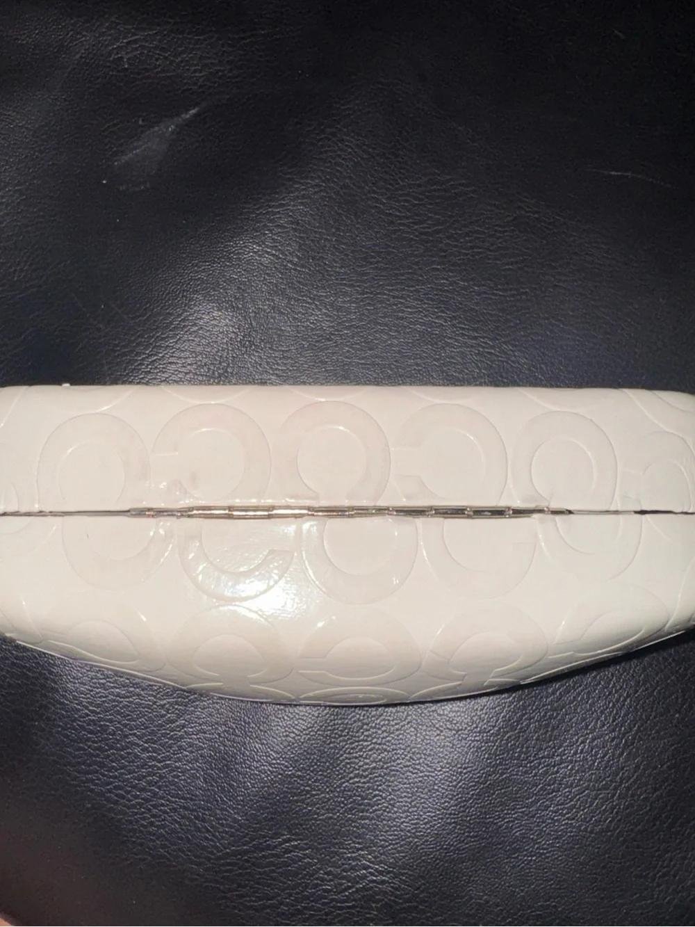 Coach cream embossed